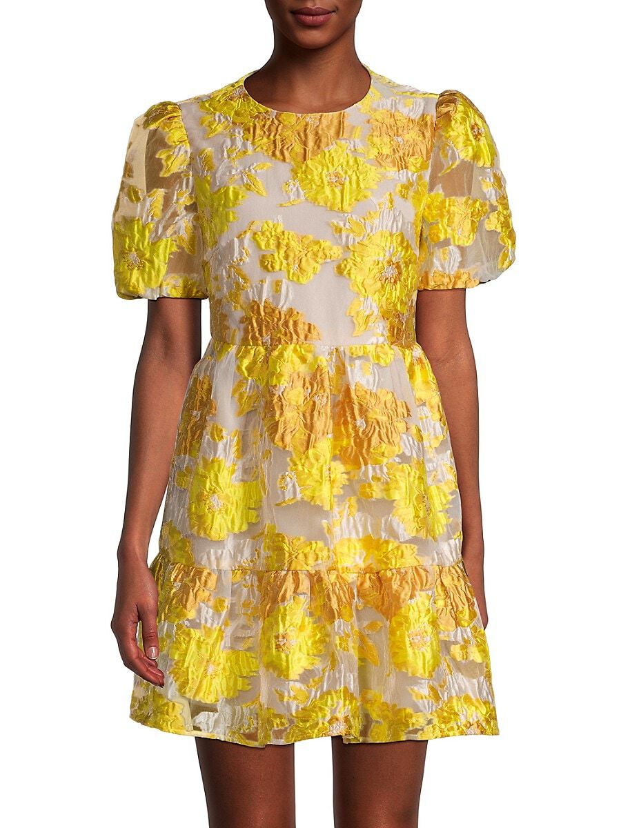 Women wearing a short yellow puff sleeve dress