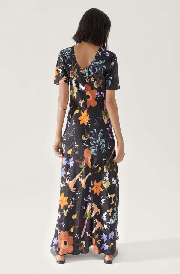 back of long black dress with floral print 